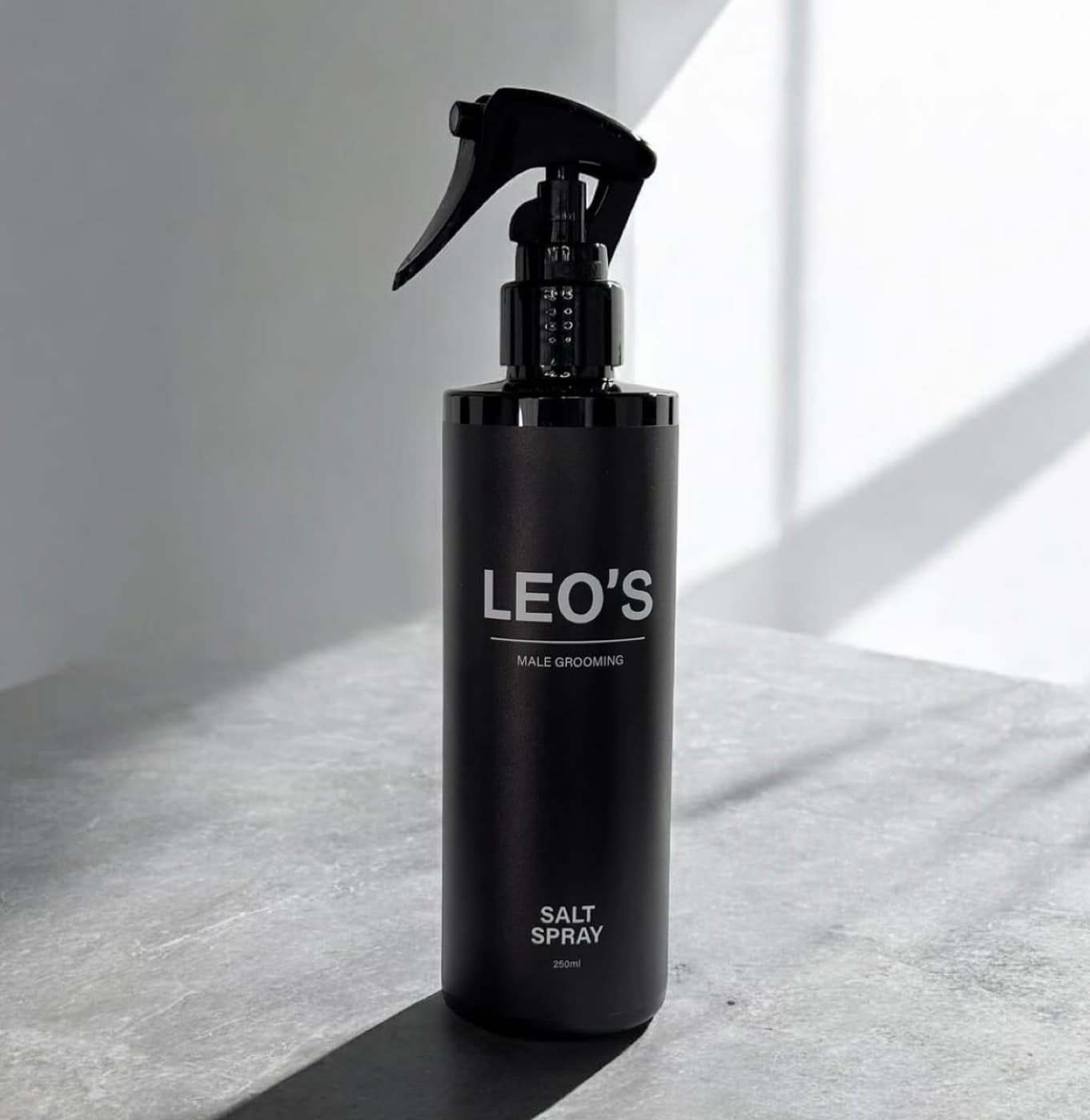 LEO'S Salt Spray in a matte black trigger bottle